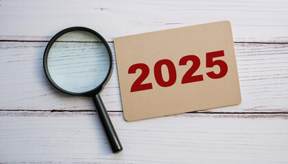 Magnifying Glass and Paper on Wooden Background for Business and Planning Focus