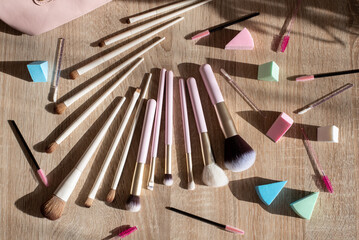 Flat lay composition with professional makeup brushes. Make-up artist kit
