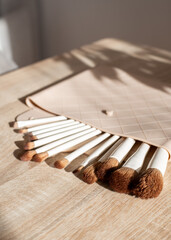 Flat lay composition with professional makeup brushes. Make-up artist kit