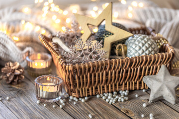 Christmas decorations in a basket. Composition with Christmas decorations.