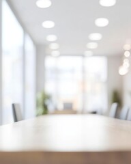 Fototapeta premium Modern blurred office workspace featuring natural light and minimalist design elements