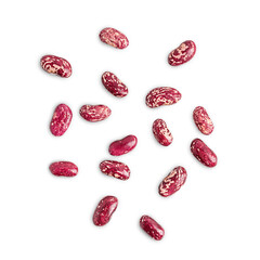 Top view of collection or set of various red dried vegetarian uncooked organic pinto beans isolated on white background used as natural food ingredient in mexican cuisine as source of healthy protein