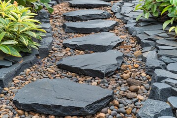Close-up view black slate stepping stones placed on pebble pathway surrounded by green plants, sleek design and natural materials, simplicity beauty of modern outdoor landscaping.