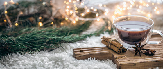 Christmas background with cup of coffee and cinnamon. Christmas concept.