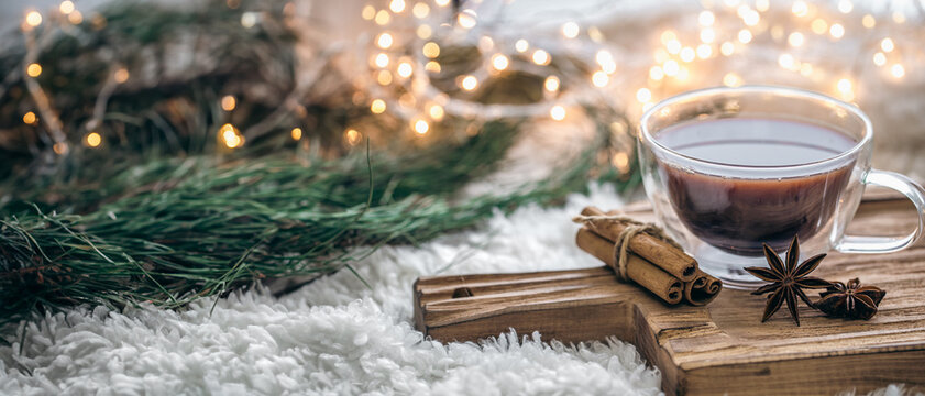 Christmas background with cup of coffee and cinnamon. Christmas concept.