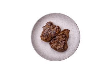 Juicy beef steak grilled with salt, spices and herbs