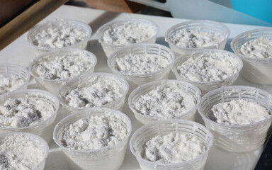 fresh handmade ricotta cheese just made by the artisan cheesemaker in the traditional dairy