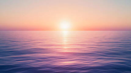 Obraz premium Calm ocean horizon with the sun setting, displaying pastel hues in the sky and water, embodying serenity and peace.