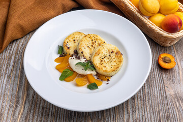 Delicious cheesecakes on a plate. Close up