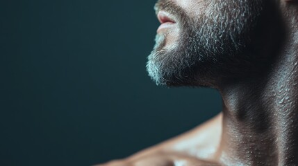 A detailed close-up of a man's neck and beard glistening with sweat, encapsulating raw masculinity and physical effort. The texture and lighting are highly emphasized.