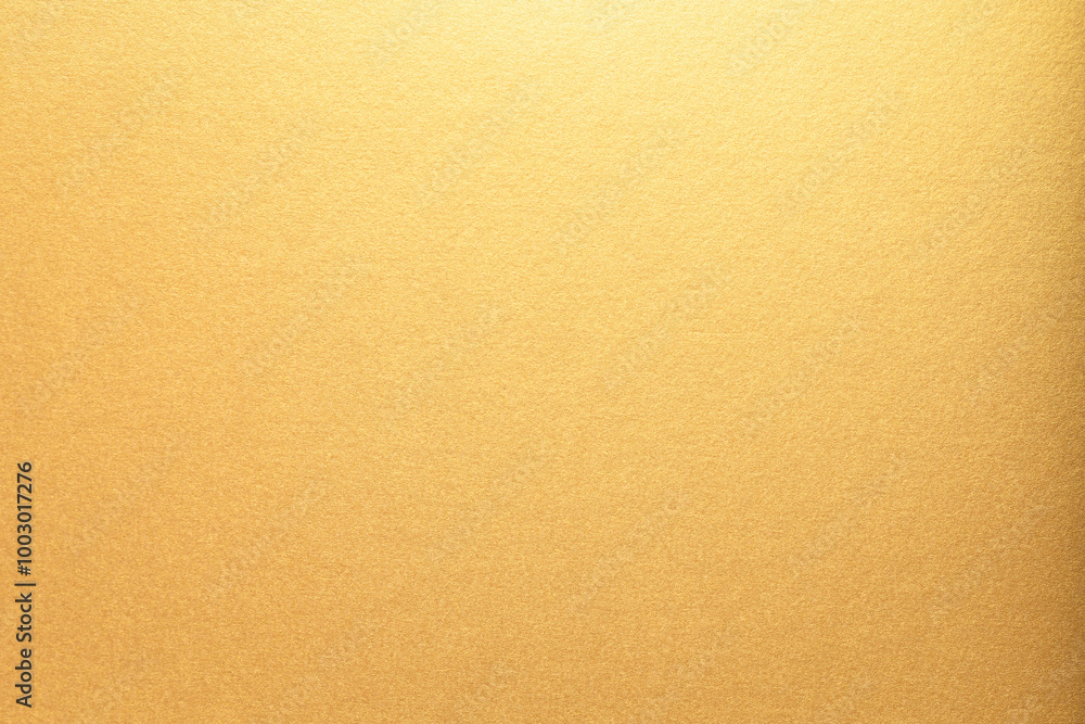 Aufkleber gold paper with a smooth, glossy texture and bright, glowing gradient. the shining metallic surface 