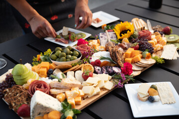 charcuterie, meats, meat, cheese, cheeses, cheeseboard, charcuterie board, fruit, nuts, vegetables, salami, kiwi, grapes, crackers, appetizer, snack, gourmet, chef, food, lunch, sweet, fresh, healthy