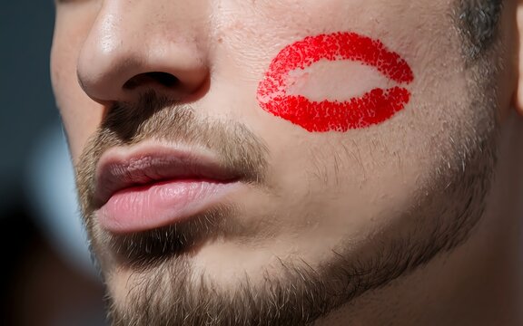 Red lipstick mark on man cheek. Romantic kiss