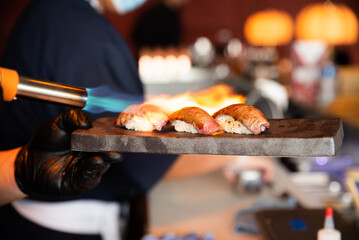 sashimi, sushi, roll, sushi roll, tuna, salmon, seafood, nigiri, roll, Japanese, restaurant, food, fish, rice, cuisine, plate, japan, gourmet, fire, seaweed, wasabi, lunch, appetizer, flame