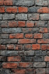 Obraz premium Textured brick wall with weathered mortar and peeling plaster in an urban setting