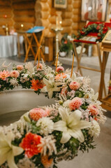 A Bouquet of Lilies and Dahlias Grace the Altar for a Baptism Ceremony