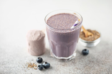 Protein blueberry chia seeds sport shake . Fitness food and drink.