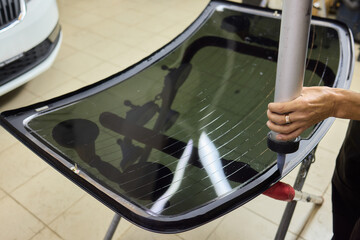 Installing windshield on a car with automotive design