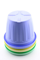 multi-colored plastic pots for seedlings and indoor plants and flowers