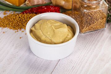 Dijon mustard sauce in the bowl