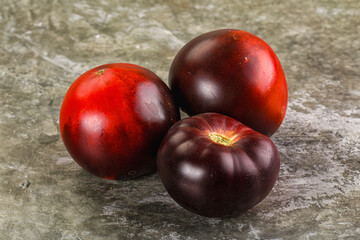 Black ripe juicy organic tomato