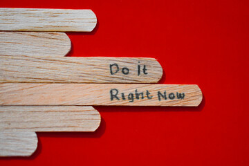 stick of ice cream with the words Do it right now. Motivational quotes, optimism, positive words. Isolated on background