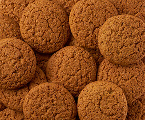 Oatmeal cookies background, oatmeal cookies round shape taken from above, close up.