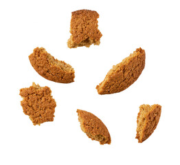 Broken round oatmeal cookies isolated on white background.