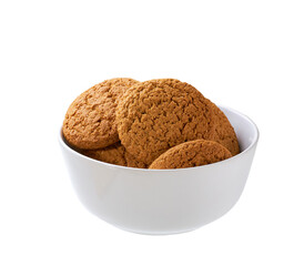 Round oatmeal cookies in a ceramic bowl isolated on white background.