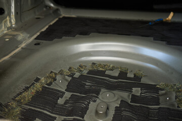 Using a scraper tool in a workshop is vital for craftsmanship and quality in applying material