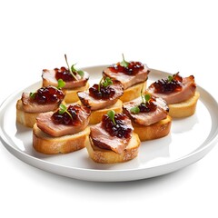Gourmet duck bruschetta with cranberry sauce and microgreens on white plate