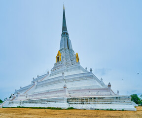 Visit Wat Phukhao Thong temple with its high white Chedi, Ayutthaya, Thailand