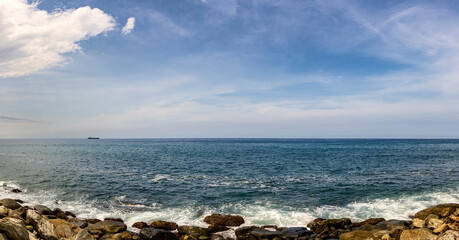 Panoramic view  of Caribbean beach on a sunny day. Macuto, La Guaira state. Venezuela