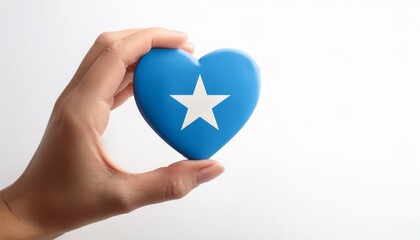 手で持っているソマリアの国旗のハート(Heart of Somalia flag held in hand.)
