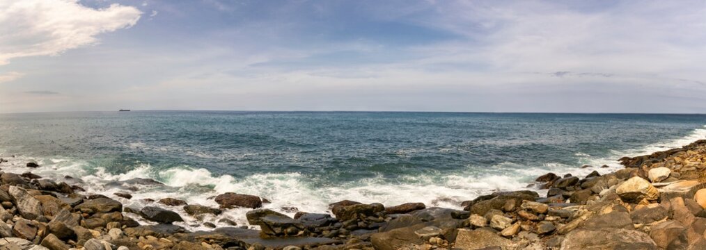 Panoramic view  of Caribbean beach on a sunny day. Macuto, La Guaira state. Venezuela