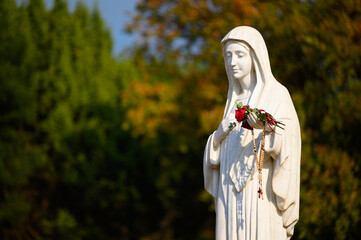 Statue of the Virgin Mary – Queen of Peace on Mount Podbrdo, the Apparition Hill overlooking the...