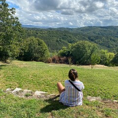 woman sitting on a bench in the park