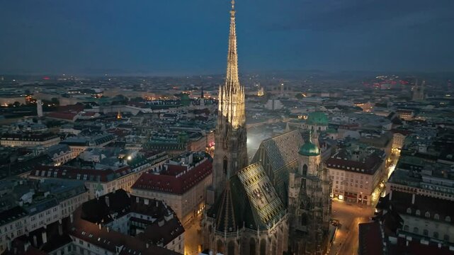 Aerial view of famous places St. Stephen's Cathedral Stephansdom at night. Mother church of the Roman Catholic Archdiocese of Vienna. Austria