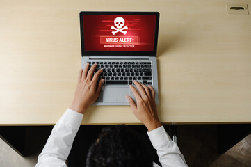 Virus warning alert on computer screen detected modish cyber threat , hacker, computer virus and...