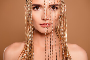 Photo of attractive celebrity lady sexy model dancer wear glitter golden veil isolated beige color...
