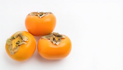 Orange Kaki persimmon is the edible fruit of a number of species of trees in the genus Diospyros. Isolated on white background with copy space