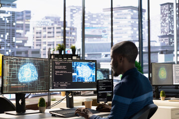 Technician testing AI company software, identifying bottlenecks in machine learning tech. Data...