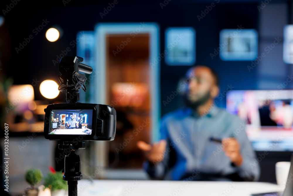 Poster focus on production camera gear used by content creator doing asmr video for fans. online show host 