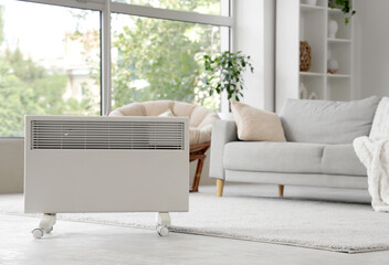 Electric heater on floor in living room
