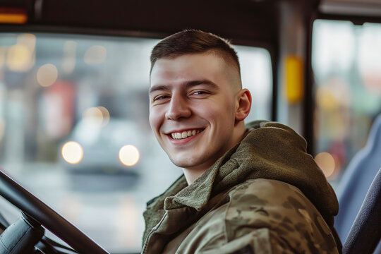 Smiling bus driver in military jacket, behind wheel, cheerful portrait, public transport concept