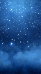 Obraz premium a night sky filled with numerous small, bright stars scattered across a deep blue background. The stars vary in brightness, with some appearing more prominent than others