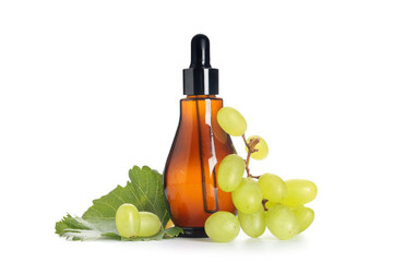 Bottle of cosmetic grape seed oil on white background