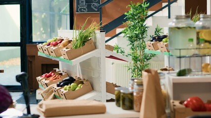 Eco friendly zero waste supermarket selling nonpolluting local organic produce, advertising healthy lifestyle. Empty grocery store having locally grown sustainable fruits, vegetables and herbs.