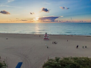 Jetty Lifeguard Tower on a sandy beach in Miami Beach at sunrise, Miami, Florida, United States.
