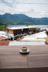 wide angle capture of double shot of espresso in outdoor market area in south america